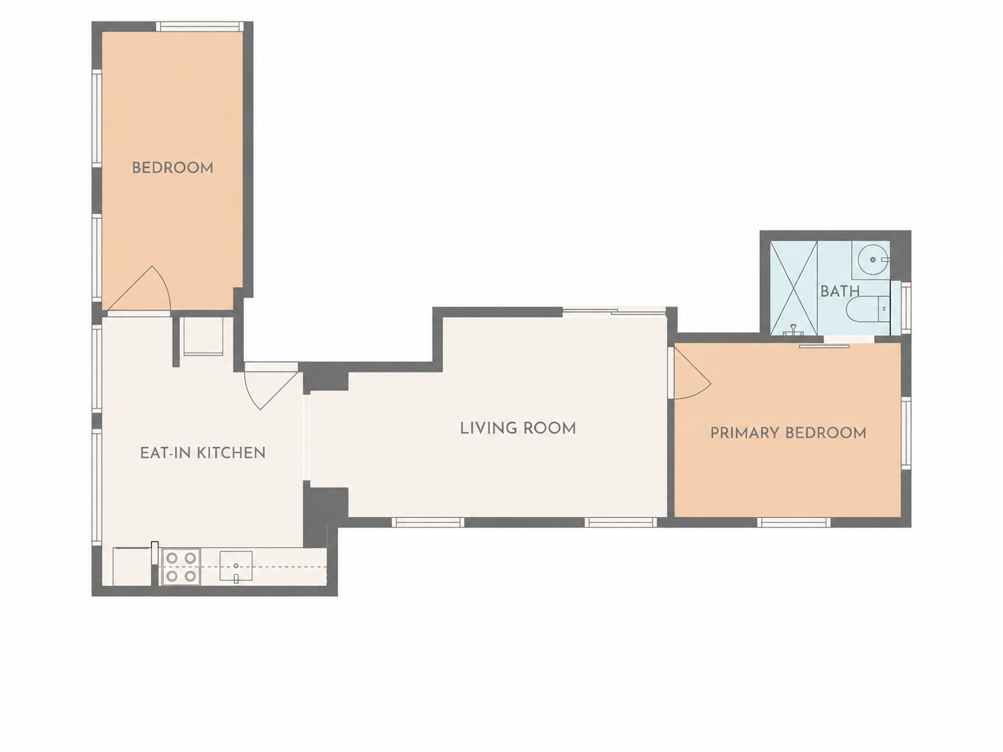 Coachman’s Quarters floor plan showing two bedrooms, an eat-in kitchen, living room and bath